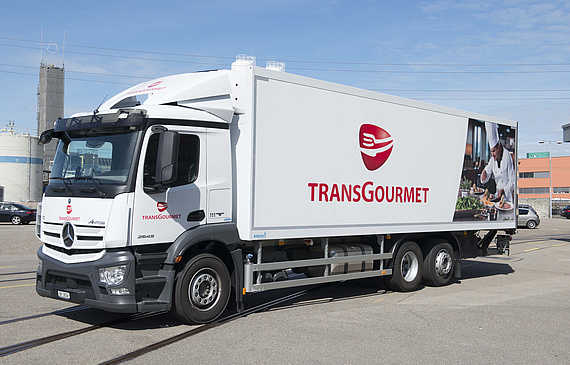 Mit "Transgourmet" beschrifteter Lastwagen. 