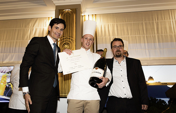 Le gagnant avec Maxime Andriveau (g.), directeur commercial de Champagne Taittinger, et Stéphane Décotterd